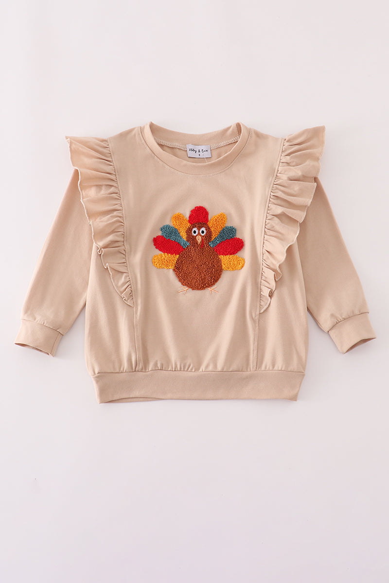 Beige turkey french knot ruffle top- In stock