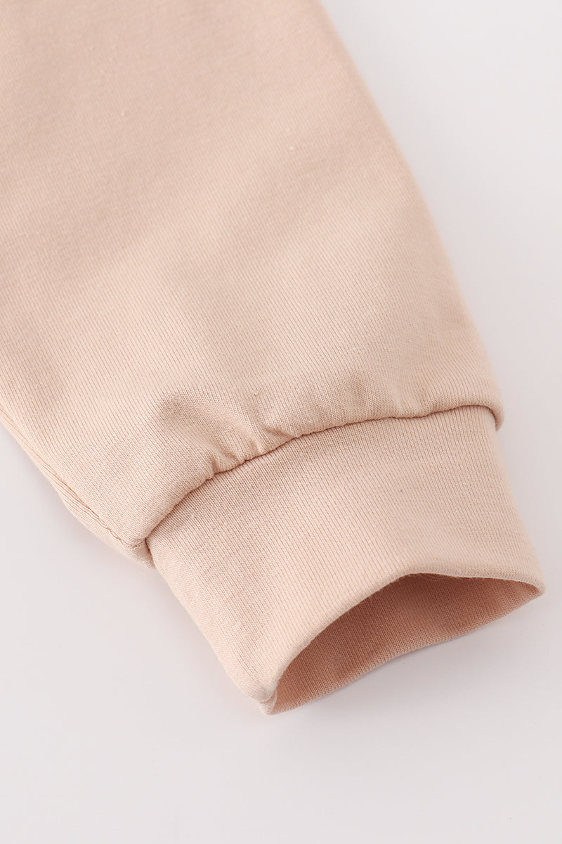 Beige turkey french knot ruffle top- In stock